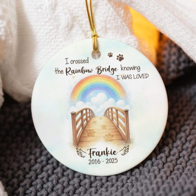 Rainbow Bridge Pet Memorial Ornament featuring a wooden bridge with paw prints leading to a rainbow in the sky, customized with pet’s name and years, a heartfelt Christmas remembrance keepsake gift for pet owners grieving the loss of their dog or cat.