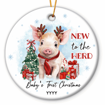 Personalized baby’s first Christmas ornament featuring a cute piglet wearing reindeer antlers and red scarf, surrounded by a Christmas tree, presents, and text New to the Herd, customized with baby’s name and year.