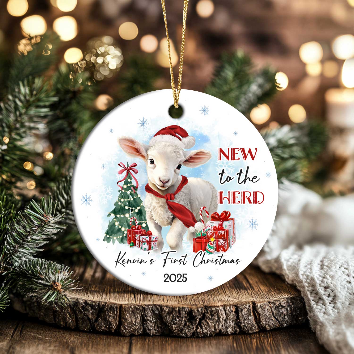 Baby Lamb Ornament featuring a cute lamb in a Santa hat and red scarf, with Christmas tree, gifts, and text New to the Herd, customized with baby’s name and year.