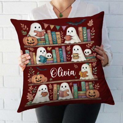 Personalized ghosts bookshelf pillow with custom name, cute spooky Halloween cushion for book lovers, cozy fall décor and seasonal gift.