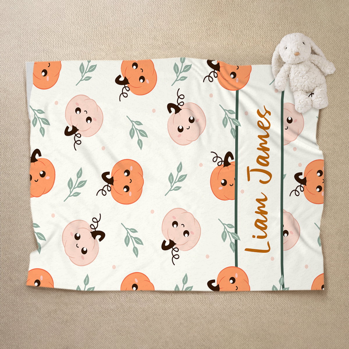 Personalized pumpkin baby blanket with name, custom fall baby shower gift, toddler Thanksgiving blanket, and autumn nursery bedding.