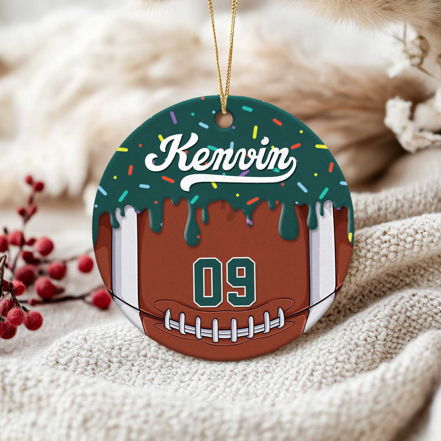 Custom football ornament with player name and number, a meaningful Christmas keepsake for football players, coaches, and teams.
