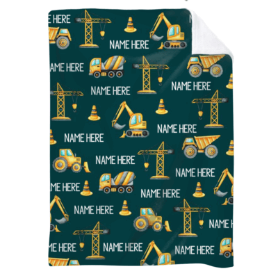 A Personalized Kid Name Blanket eaturing construction vehicles, customizable with different colors and names, is shown in a cozy living room.