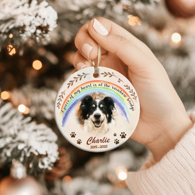 Personalized Pet Photo Ornament - Pet Sympathy Gift featuring a rainbow design and a dog’s photo with the text “A piece of my heart is at the rainbow bridge,” personalized with the pet’s name and years.