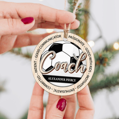 Personalized soccer coach Christmas ornament with custom name, unique appreciation gift from team.