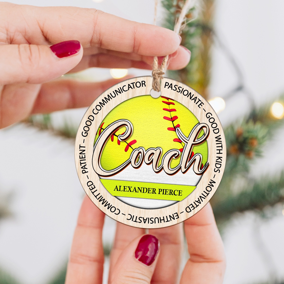 Personalized softball coach Christmas ornament with custom name and team, appreciation gift from players.