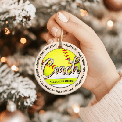 Personalized softball coach Christmas ornament with custom name and team, appreciation gift from players.