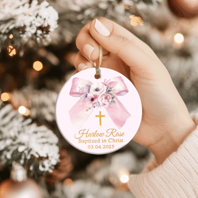 Custom Christening Christmas Ornament - Baptism Gift for Girl with floral bow and gold cross design. Custom name and date Christening gift, porcelain keepsake for baby’s baptism, dedication, or first Christmas celebration.