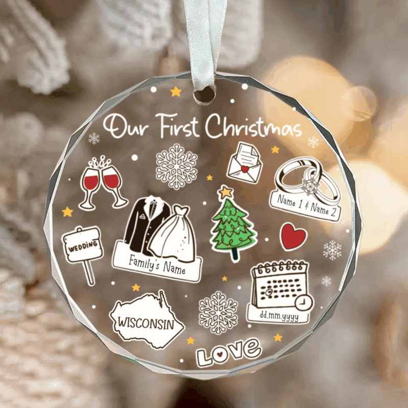 Our First Christmas Glass Ornament – Personalized Newlywed Gift featuring couple’s names, wedding icons, and date, with festive decorations and “Our First Christmas” text, hanging on Christmas tree as a newlywed keepsake gift.