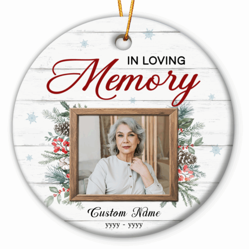 Personalized Memorial Photo Ornament - Memorial Christmas Gift featuring “Merry Christmas in Heaven” and "In Loving Memory" text, custom photo, name, and years, surrounded by festive greenery and red berries on a wooden background.