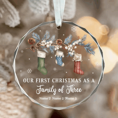 Personalized Family of Three Christmas Ornament with custom name and year, glass keepsake decoration for new parents’ first Christmas together.
