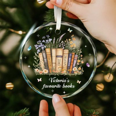 Personalized Book Lover Ornament featuring floral bookshelf design with custom book titles, glass Christmas ornament gift for readers and bookworms.