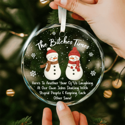 Funny best friend Christmas ornament reading ‘The Bitches Times 2025,’ humorous friendship glass keepsake gift for besties.