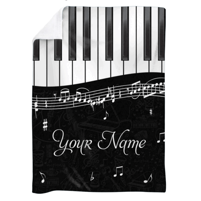 Personalized piano blanket with custom name and black-and-white piano design