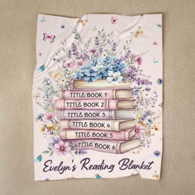 Personalized floral book blanket with custom book titles and name – cozy library blanket for book lovers and bookish reader birthday décor.