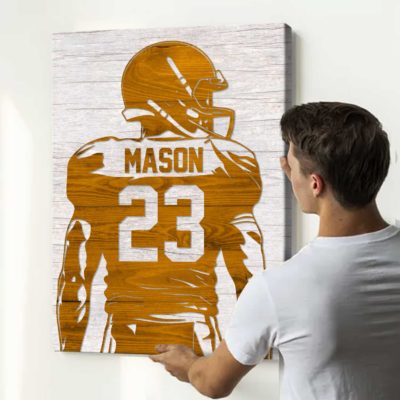 Personalized football player silhouette sign with custom name and number, football gift for son and sports room wall art.