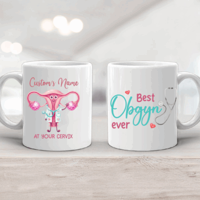 Personalized OBGYN Coffee Mug - Funny Doctor Gift featuring a cute cartoon uterus doctor illustration design on a white ceramic mug. This is a custom doctor name keepsake, OBGYN appreciation gift, at your cervix gynecologist mug.