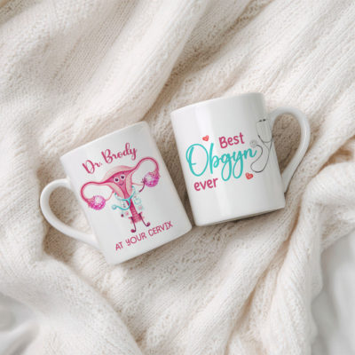 Personalized OBGYN Coffee Mug - Funny Doctor Gift featuring a cute cartoon uterus doctor illustration design on a white ceramic mug. This is a custom doctor name keepsake, OBGYN appreciation gift, at your cervix gynecologist mug.