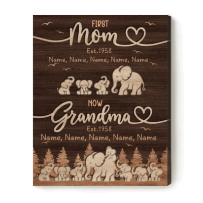 Custom First Mom Now Grandma Canvas - Mothers Day Gift for Grandma with rustic wood background, elephant family illustration, and custom kids and grandkids names, displayed on a wall as a meaningful gift for grandma