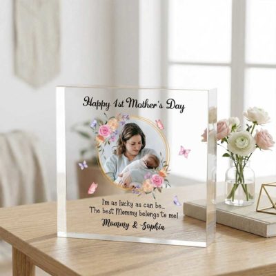 Happy First Mothers Day Photo Acrylic Block - Personalized Mothers Day Gift with mom and baby picture, floral frame, and “Happy 1st Mother’s Day” message with custom names, displayed on a table as a gift for new mom