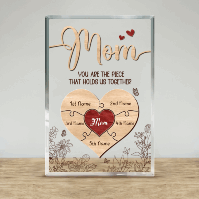 Personalized Puzzle Mom Plaque with Kids Names - Mothers Day Gift with heart-shaped design, kids names on puzzle pieces, and “You are the piece that holds us together” message, displayed as a meaningful gift for mom