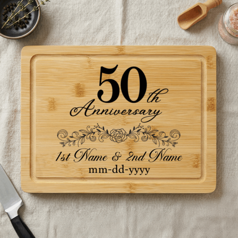 Personalized 50th Anniversary Cutting Board - Wedding Anniversary Gift engraved with names and date, displayed as a golden anniversary gift for couples