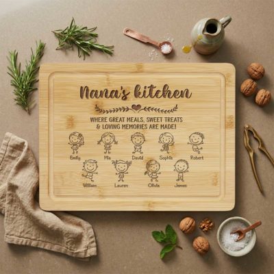 Nana's Kitchen Personalized Cutting Board - Gift for Grandma engraved with “Nana’s Kitchen,” custom grandkids names, stick-figure children illustrations, and heartfelt kitchen quote, displayed as a gift for grandma.